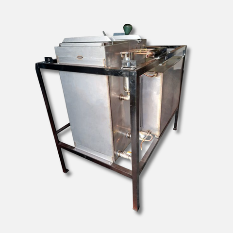180-litre continuous-flow methylene chloride recovery still with clean and dirty tanks